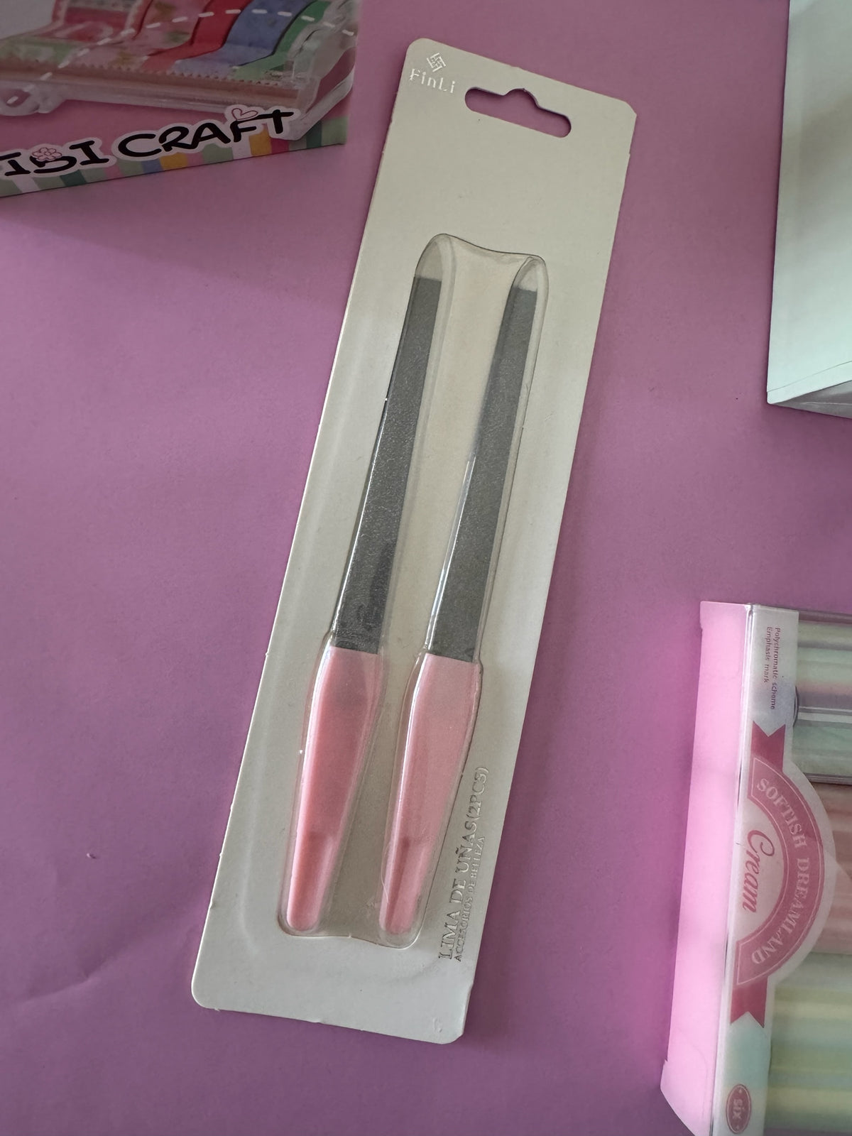 Set de dos limas de uñas profesionales Brena con mango ergonómico rosa y superficie abrasiva de grano fino